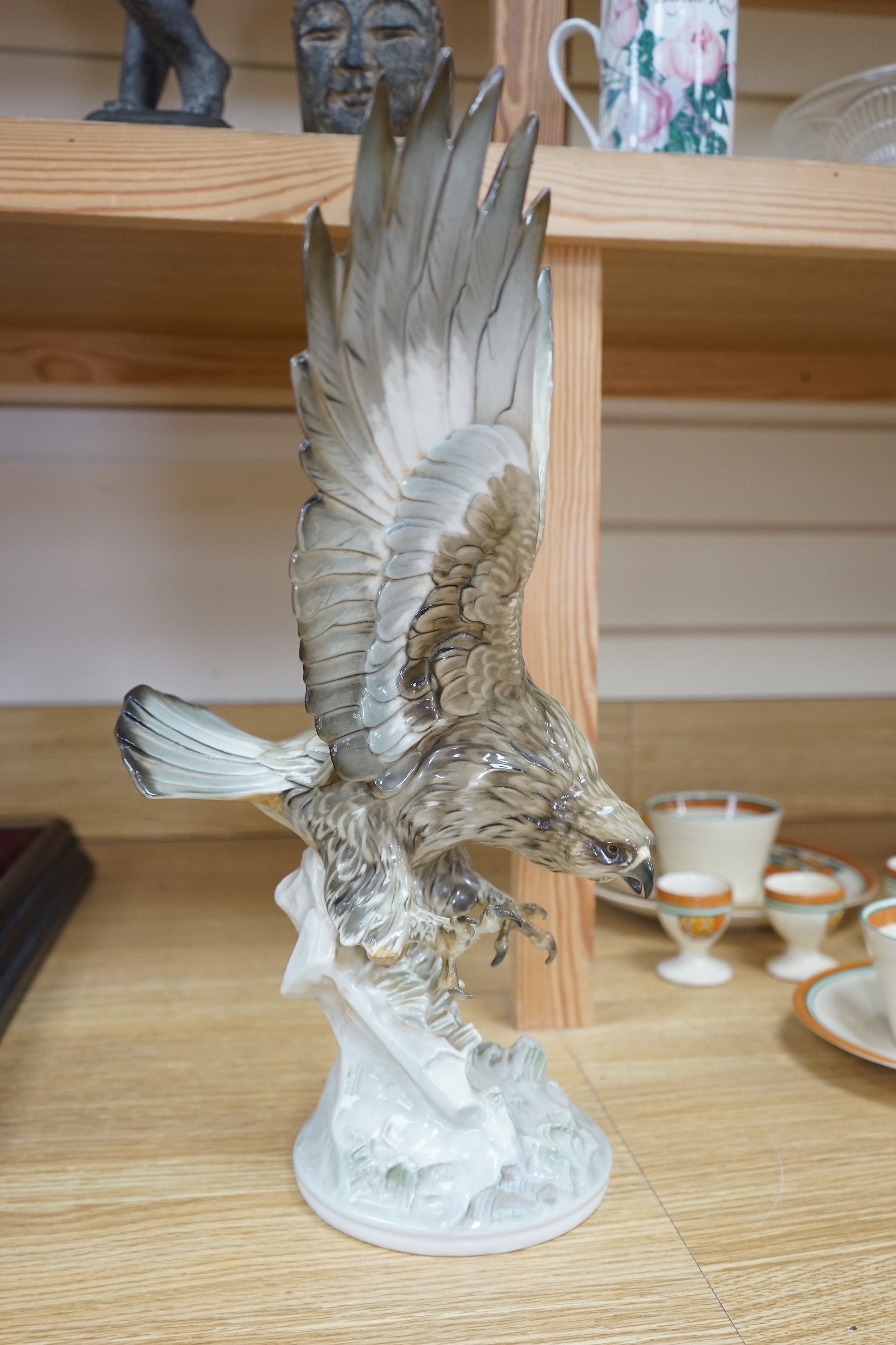 Karl Tutter (1883-1969) for Kutschenreuther, a porcelain model of a hawk, 42cm. Condition - restoration? otherwise good